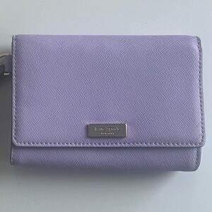 Never used authentic Kate Spade leather wallet in lilac
